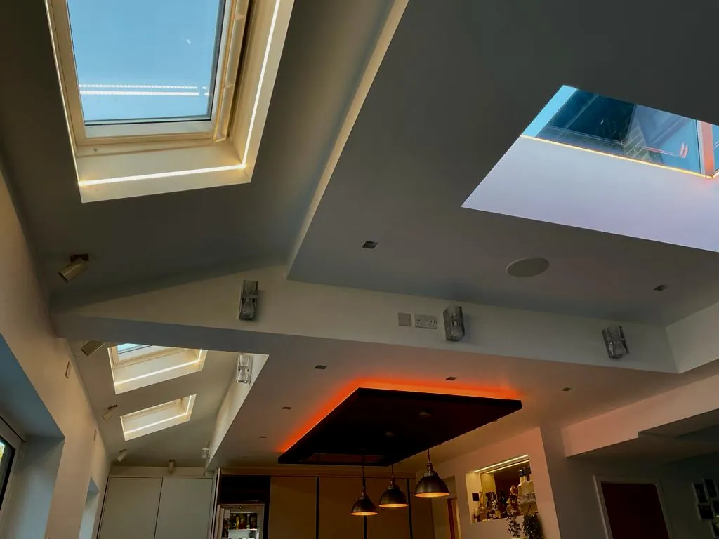 Kitchen ceiling with rooflights, LED strip and pendant lights