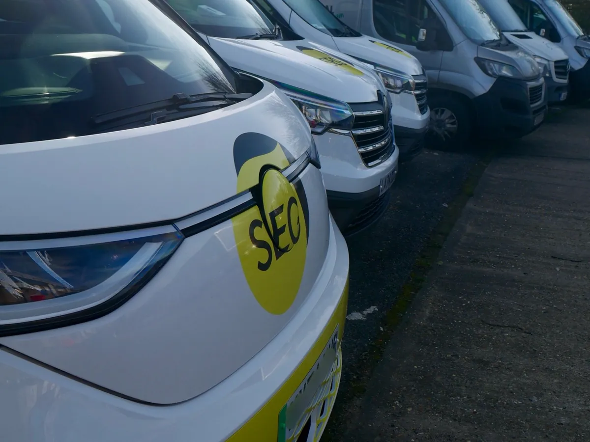 Row of SEG vans parked together