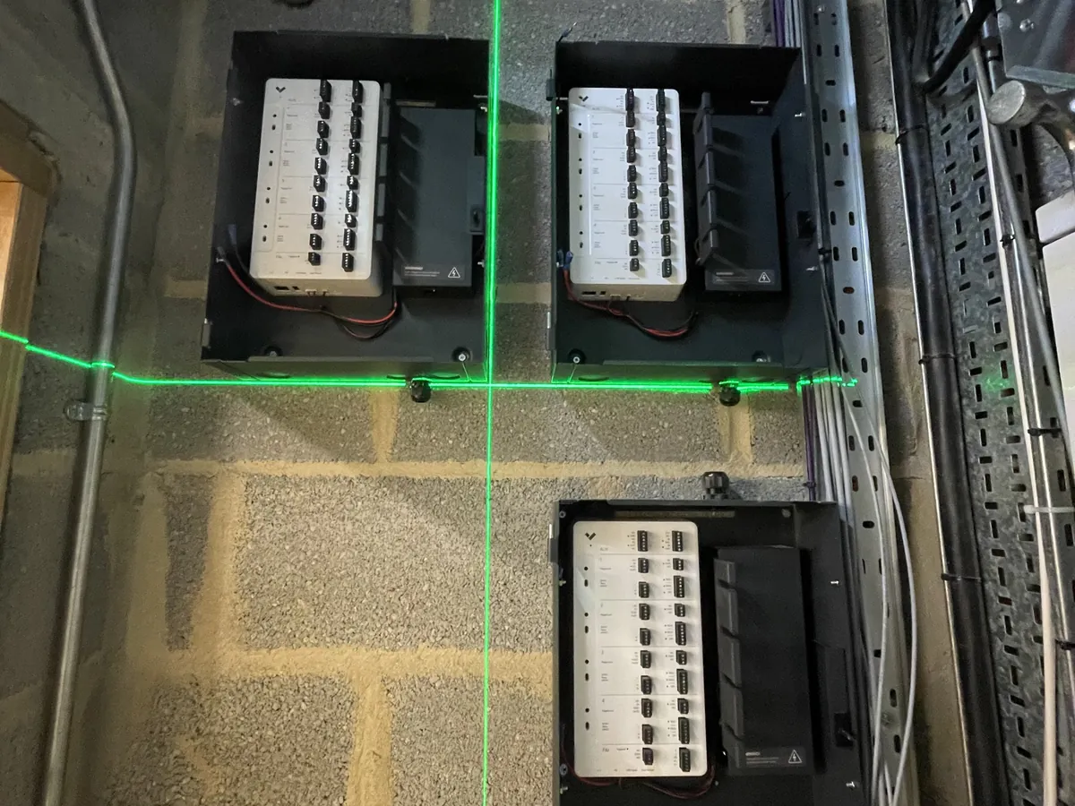 Verkada controllers mounted on a block wall with neat containment
