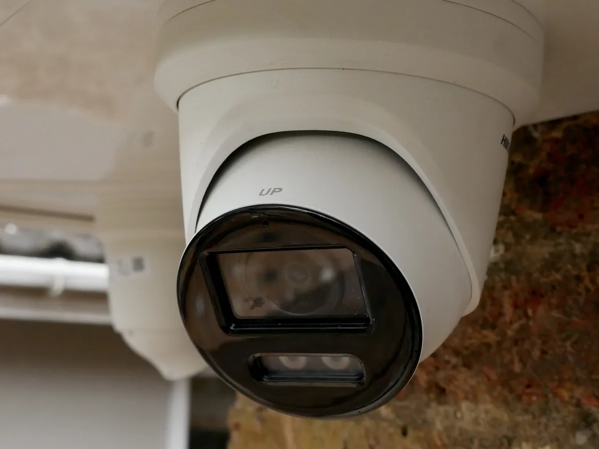 Turret CCTV camera mounted under a soffit