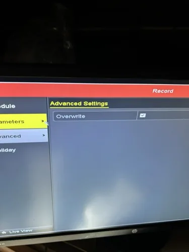 CCTV recorder settings screen with the overwrite option ticked