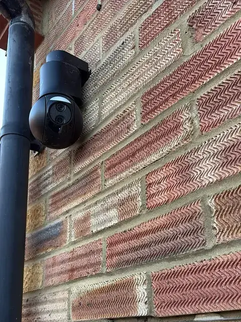 UniFi camera fitted beside a downpipe on SEG's head office in Chiswell Green, St Albans