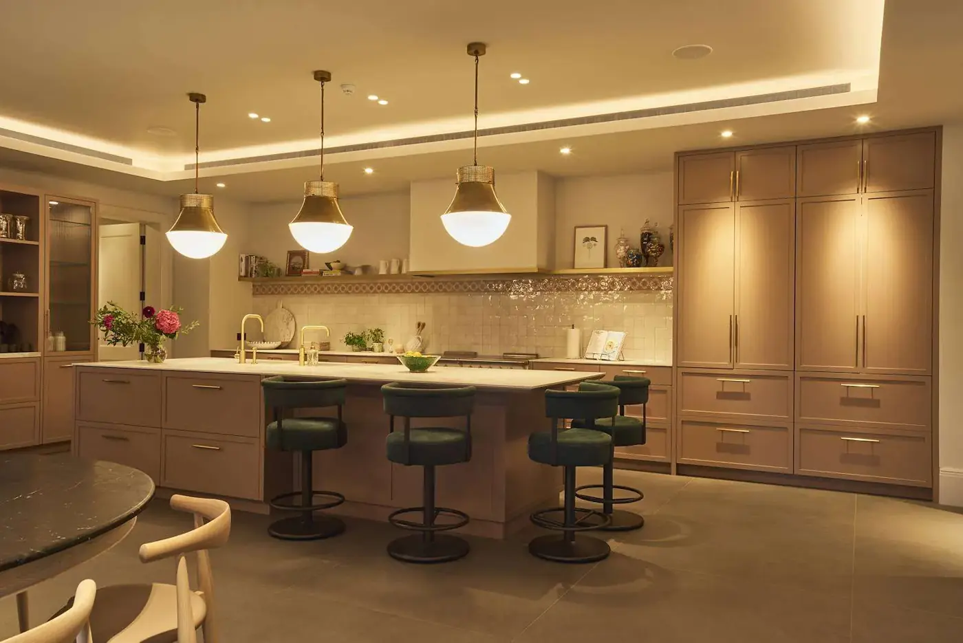 Kitchen with pendant lights and recessed ceiling lighting