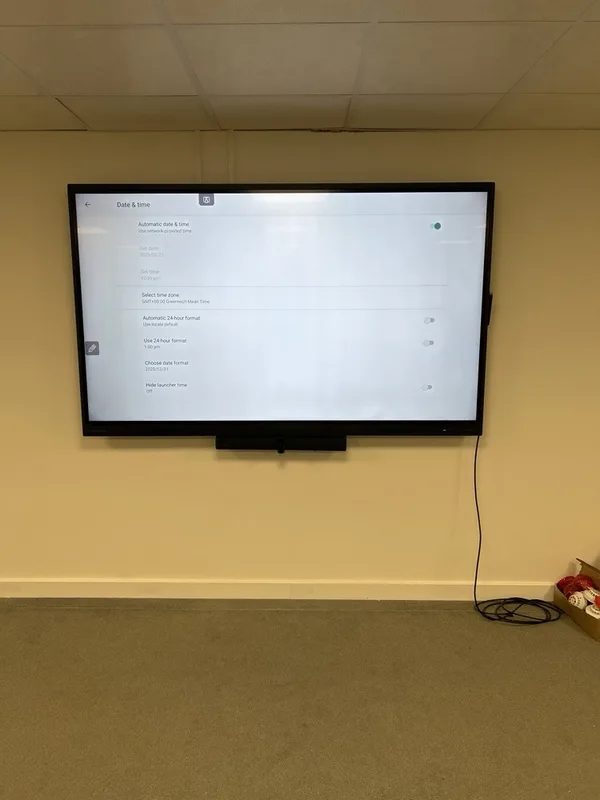 Interactive screen mounted in a hotel conference room