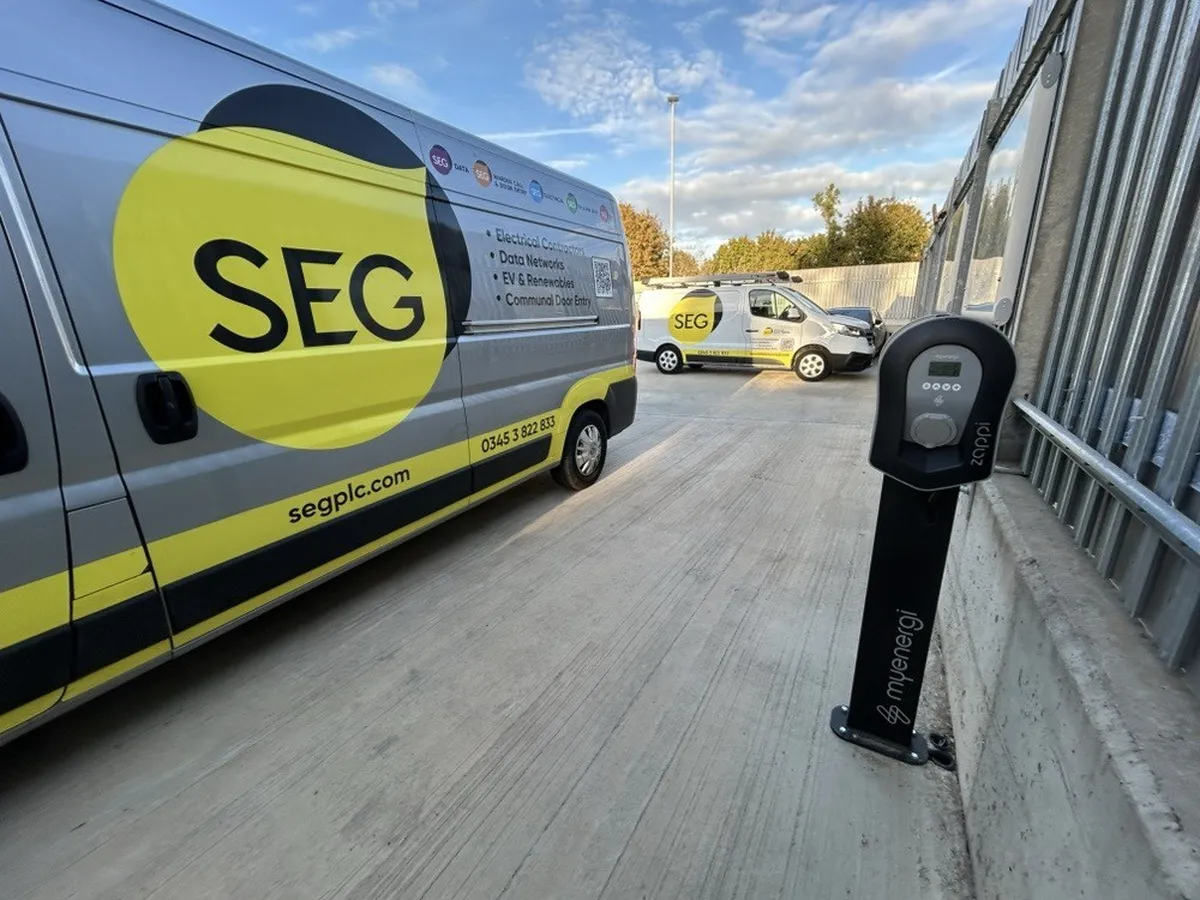 Dual myenergi Zappi charging post beside an SEG van at the depot