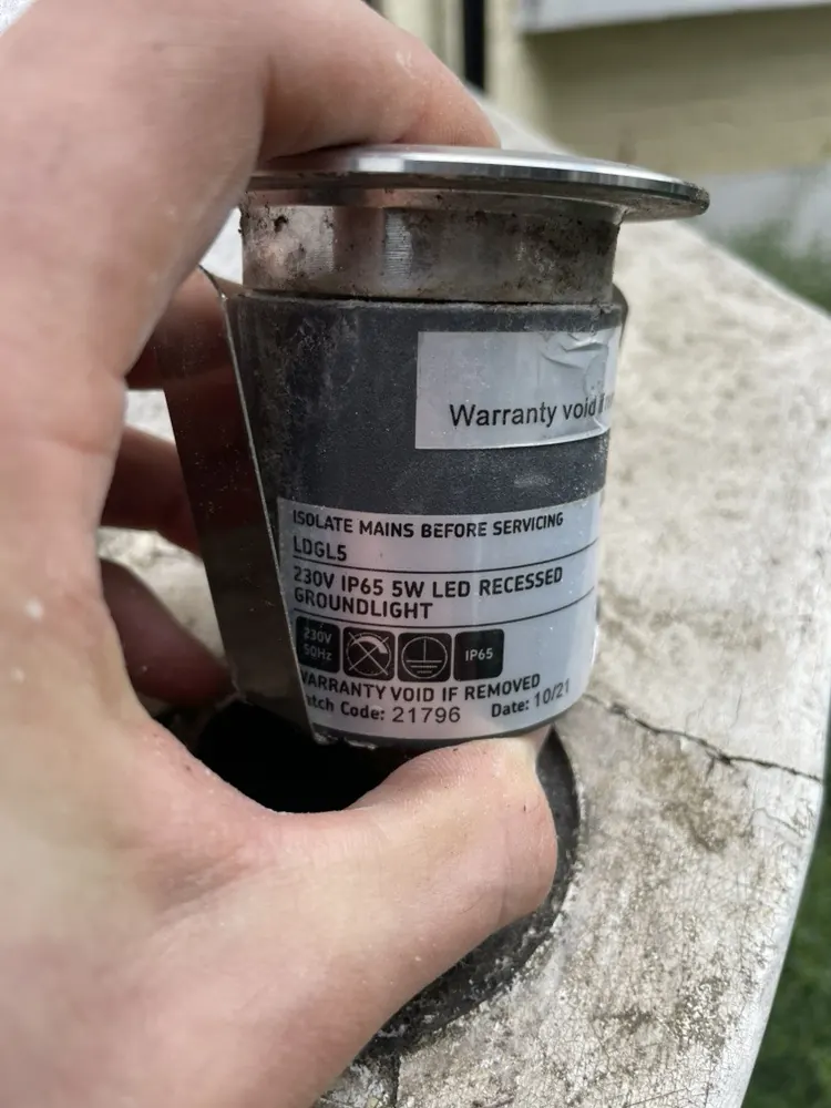 The failed sealed floor light coming out