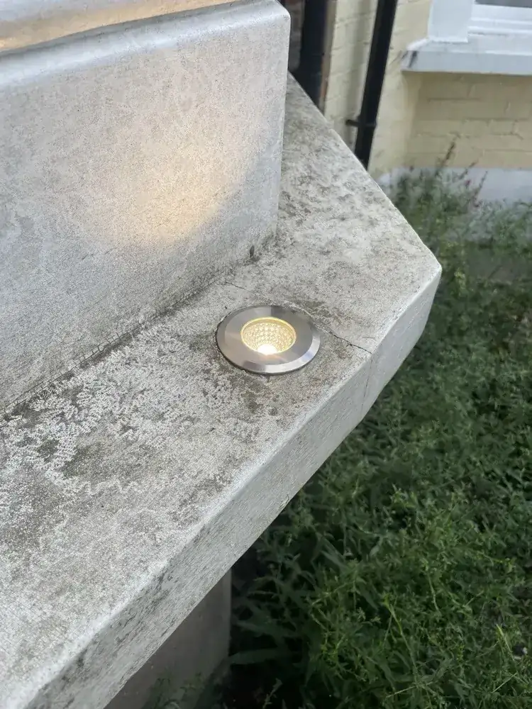 Replacement recessed floor light at the front of the house