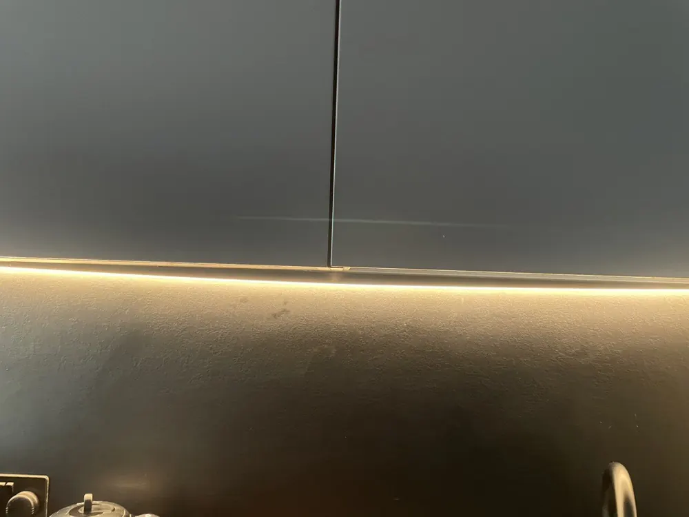 Under-cabinet LED strip back on in the kitchen