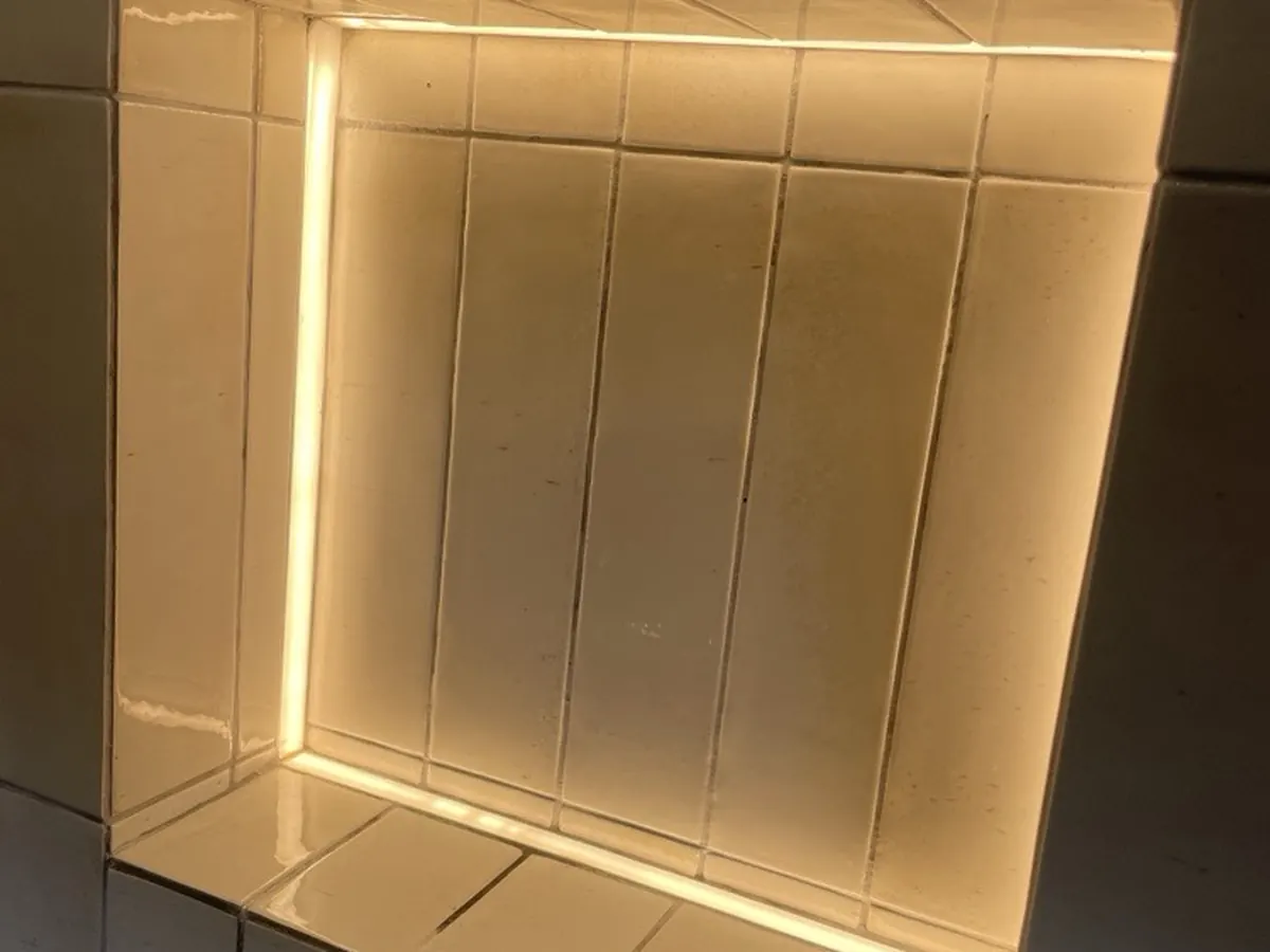 LED strip lighting in a shower niche, working again, in Wood Green