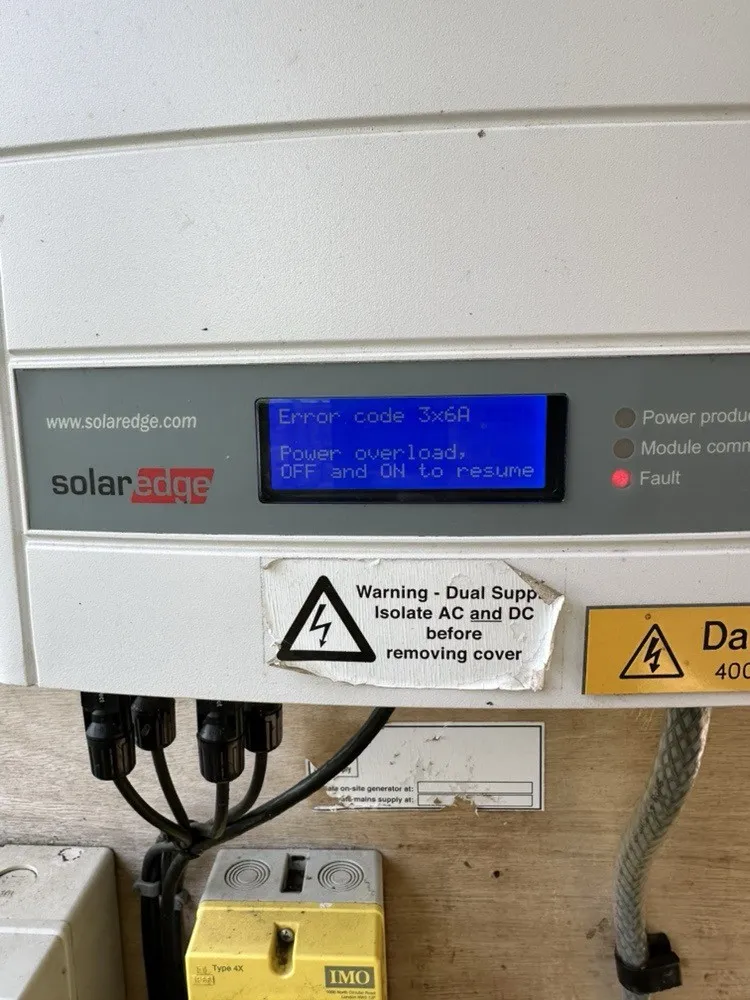 SolarEdge inverter showing the fault code on arrival