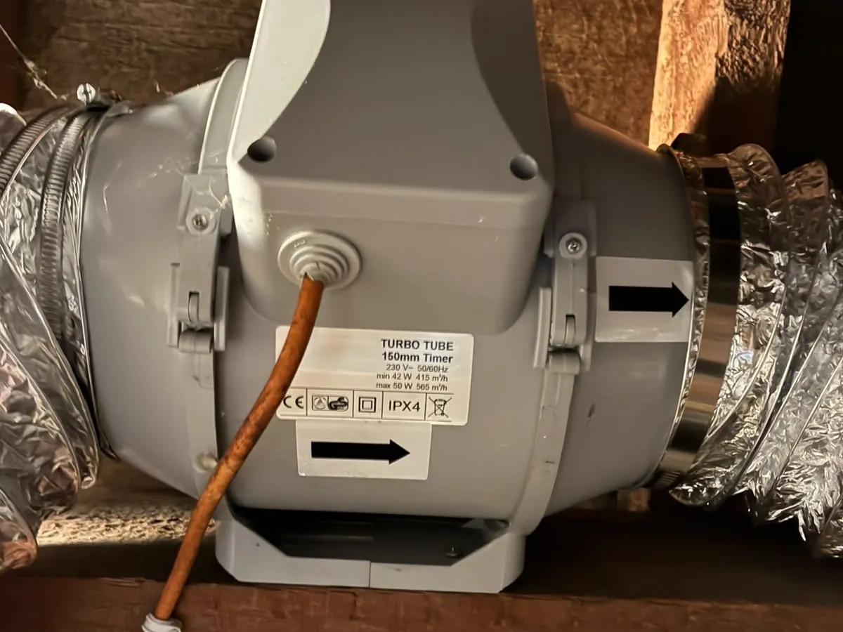 The replacement 150mm inline fan fitted in the loft