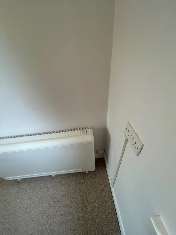 Slimline new storage heater fitted in a flat