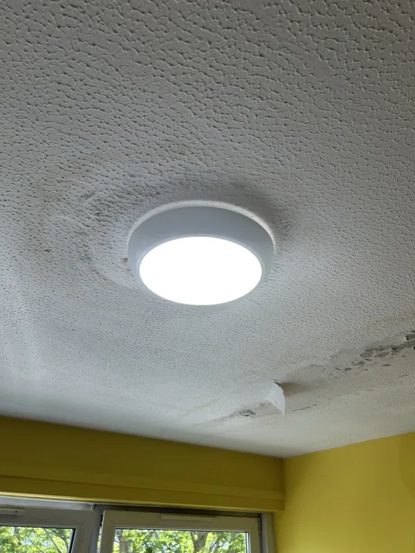 New LED ceiling light fitted after a leak